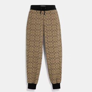 Coach signature khaki & black women’s joggers Size M